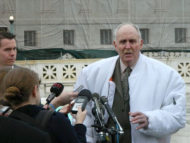 Indiana farmer Vernon Bowman talks to reporters following a Supreme Court hearing in February about a case of Bowman buying and replanting Roundup Ready soybeans. (DTN file photo)